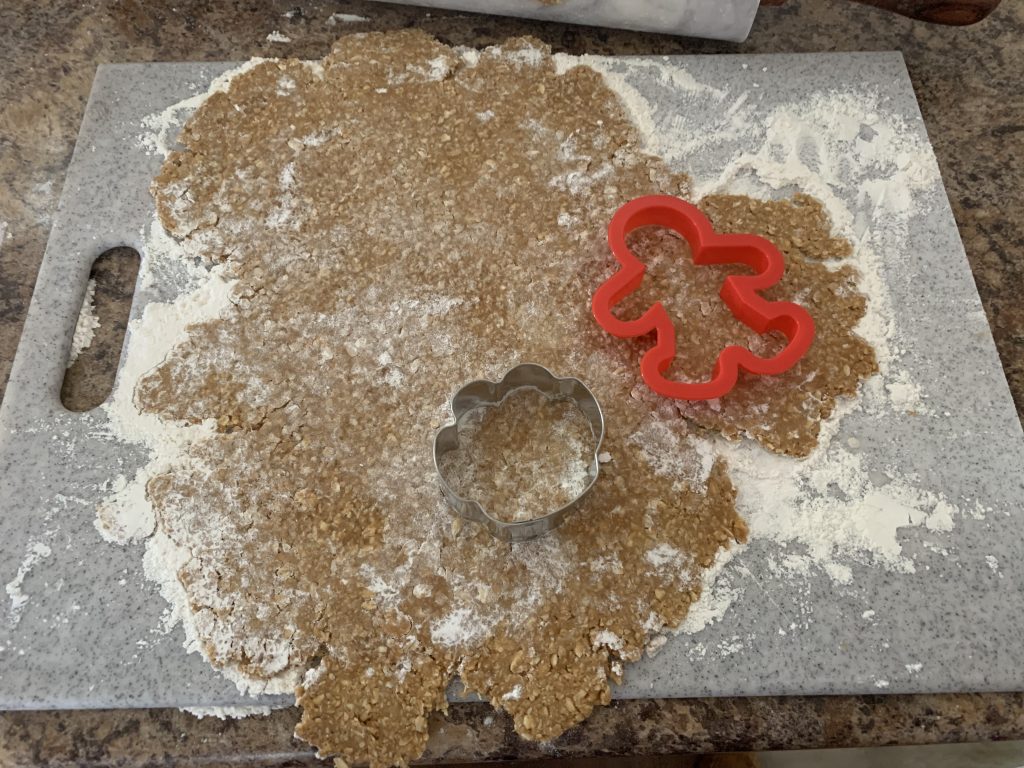 flattened banana peanut butter oat mixture with two cookie cutters